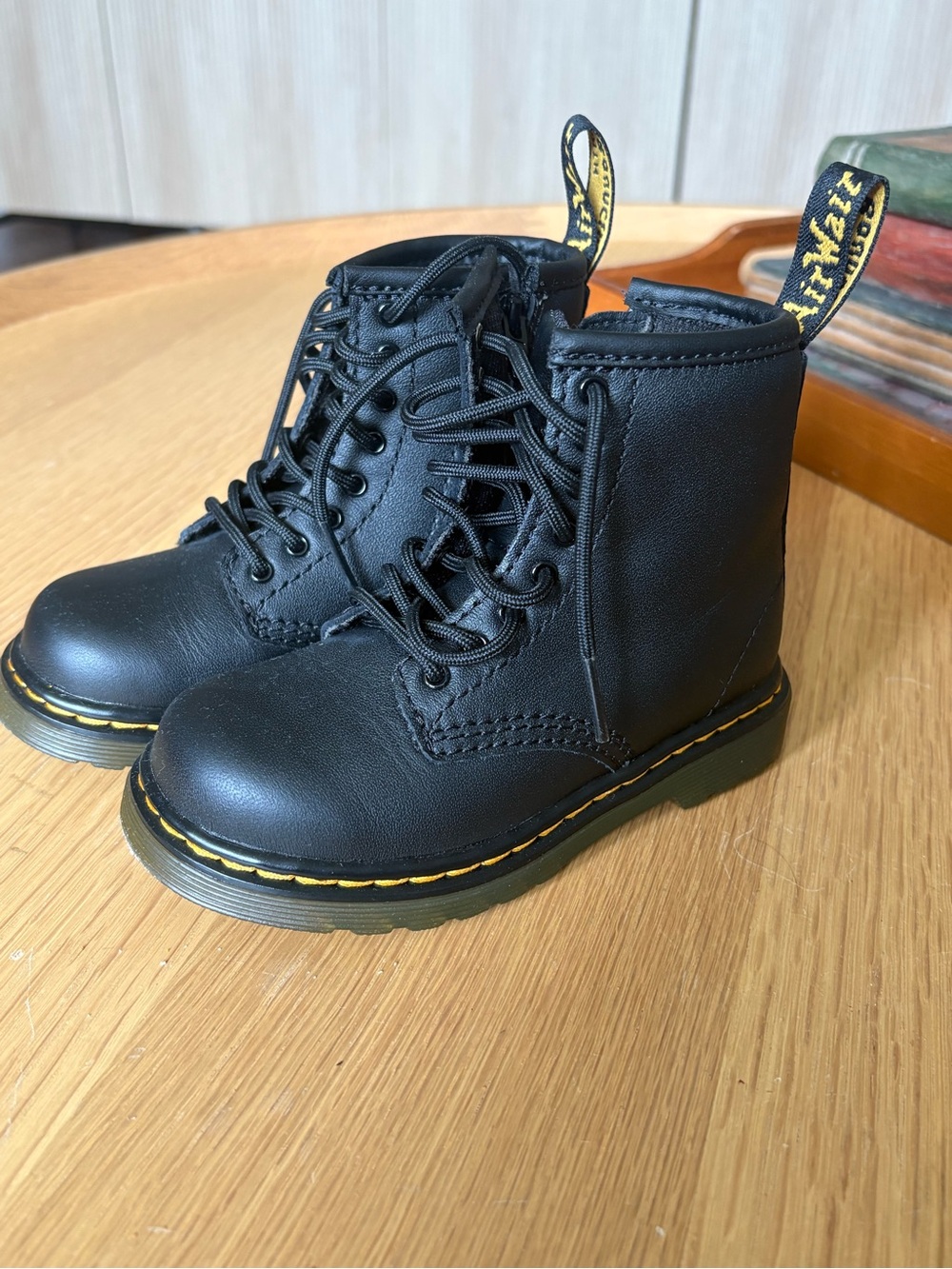 Dr. Martens Black Leather Kids Lace-Up Ankle Boots with Yellow Stitching